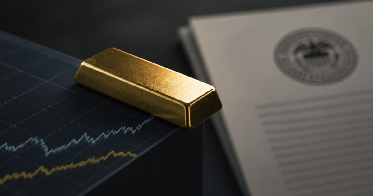 A polished gold bar balanced at the edge of a dark bond-yield chart beside a softly blurred central-bank document.